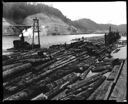 Log boom on river, 7/31/1936, #13571_1