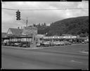 Peterson's Auto Mart car lot and Rayonier sign, 7/28/1959, #34756_1