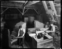 Man and women with trim saw in Grays Harbor Veneer Co. plant, 3/7/1926, #10627_1