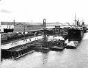 Dock construction with ship CROSS KEYS, circa 1930, #L400397_1