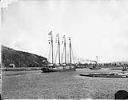 Steam tugboat towing four-masted ship, circa 1910, #L400519_1