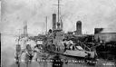 Navy ship of the Monitor type with 3 submarines, circa 1910, #L400571_1