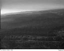 Timber on hills with logged land in the distance, 1948, #L31R20F2_1