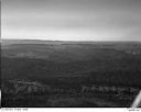 Timber on hills with logged land in the distance, 1948, #L31R20F4_1