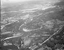 Unidentified river, forest land and town in the distance, 5/14/1948, #L31R5F14_1