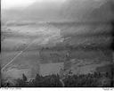 Unidentified farms, fields and roads in a valley surrounded by forested hills, 8/9/1948, #L31R9F1_1