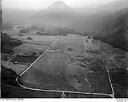 Unidentified farms, fields and roads in a valley surrounded by forested hills, 8/9/1948, #L31R9F4_1