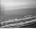 Birds in flight above the surf along beach, 4/26/1949, #L32R27F17_1